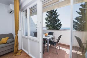 Posezení v ubytování Apartments by the sea Semy