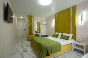 Postel nebo postele na pokoji v ubytování Milana SPA & Hotel - SPA included