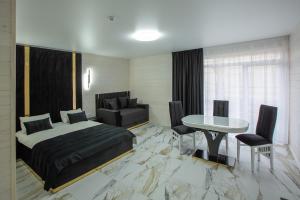 Postel nebo postele na pokoji v ubytování Milana SPA & Hotel - SPA included