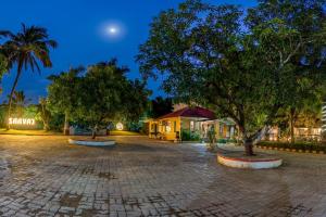 Aed väljaspool majutusasutust Saavaj Resort, Sasan Gir - Where Wilderness Meets Luxury