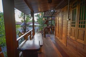 Balkón nebo terasa v ubytování Suk Sabai Homestay