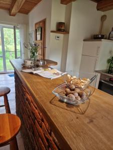 a kitchen counter with a bowl of food on it at Bieszczadzki Kąt in Lesko