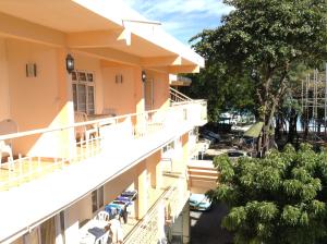 a view from the balcony of a hotel at Ebrahim Flats - Grand Baie Beach in Grand-Baie