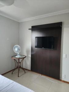 Un televizor și/sau centru de divertisment la Home Ways Residence - 3 Quartos