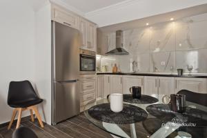 Kuchyň nebo kuchyňský kout v ubytování Helios Apartment 2 + 8 fotografií