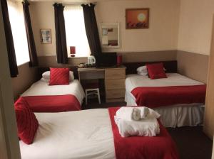 Ένα ή περισσότερα κρεβάτια σε δωμάτιο στο The Aberford