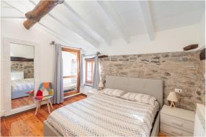Postel nebo postele na pokoji v ubytování Il rustico DN ART holidays home - alloggio tipico
