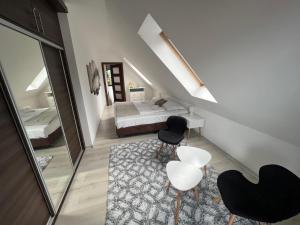 Łóżko lub łóżka w pokoju w obiekcie Apartament Urocza przy Wyciągu SKI Arena