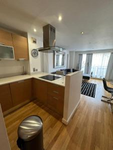a kitchen with a sink and a counter top at Two BR Flat 5 mins walk from London eye G96 in London