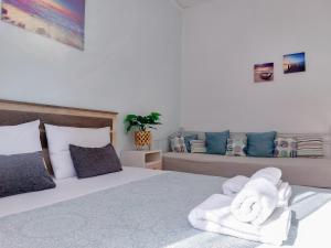 Krevet ili kreveti u jedinici u okviru objekta Holiday House Heraklion