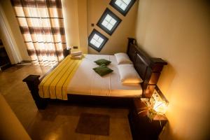 Postel nebo postele na pokoji v ubytování Evergreen Hotel Dambulla