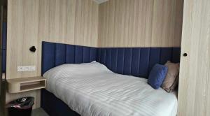 Voodi või voodid majutusasutuse Hotel Les 3 Cles toas