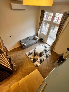 an overhead view of a living room with a couch at A96 in Budapest