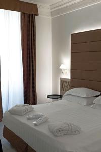 Postel nebo postele na pokoji v ubytování BB Hotels Smarthotel Bailey's