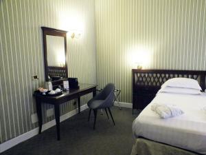 Postel nebo postele na pokoji v ubytování BB Hotels Smarthotel Bailey's