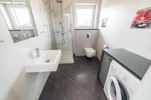 Um banheiro em Silver One Apartments