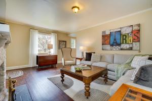 a living room with a couch and a table at Cozy Zanesville Home about 9 Mi to Dillon State Park! in Zanesville