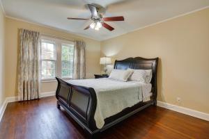 a bedroom with a bed and a ceiling fan at Cozy Zanesville Home about 9 Mi to Dillon State Park! in Zanesville