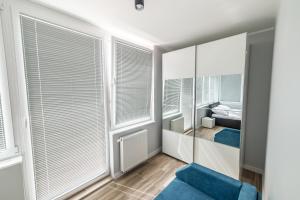 Cama ou camas em um quarto em Silver One Apartments