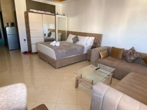 Χώρος καθιστικού στο Studio face à la plage de Tanger