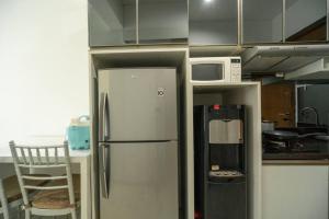 Kuchyň nebo kuchyňský kout v ubytování Warm and Comfy studio in central Jakarta, SCBD