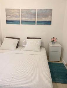 Cama o camas de una habitación en Cozy Malakoff Studio - Near Paris 3 fotos más