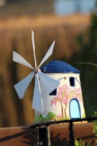 a model of a house and a wind turbine at Dibek Homes Villa & Hotel in Yalıkavak