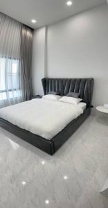 En eller flere senge i et værelse på HomeHug@ChiangRai