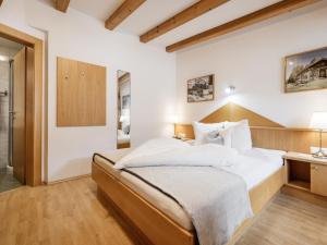 Postel nebo postele na pokoji v ubytování Alpenapartments