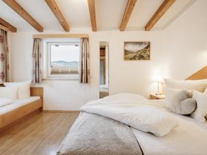 Postel nebo postele na pokoji v ubytování Alpenapartments