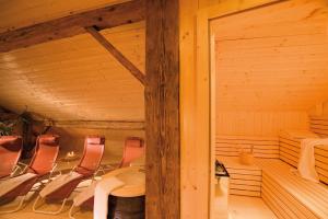Postel nebo postele na pokoji v ubytování Naze`s Hus Mellau