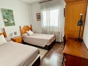 Postel nebo postele na pokoji v ubytování Casa rural Lomalinda