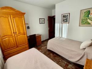 Postel nebo postele na pokoji v ubytování Casa rural Lomalinda