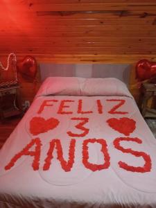 Ένα ή περισσότερα κρεβάτια σε δωμάτιο στο Chalé lua cheia