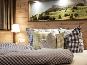 Postel nebo postele na pokoji v ubytování Alpenapartments
