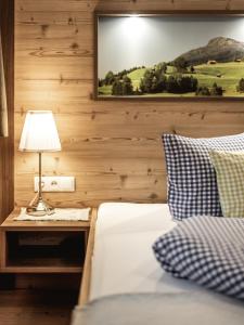 Postel nebo postele na pokoji v ubytování Alpenapartments