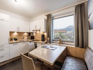 Kuchyň nebo kuchyňský kout v ubytování Alpenapartments