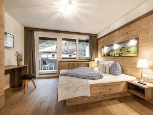Postel nebo postele na pokoji v ubytování Alpenapartments