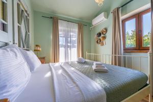 Postel nebo postele na pokoji v ubytování Paradise Villas Istria