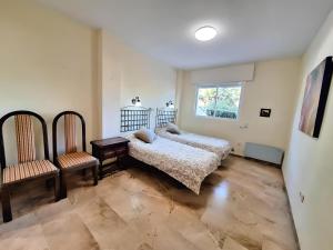 Posteľ alebo postele v izbe v ubytovaní Gorgeous 2BR Apt. w/ Mountain View Puerto Banus + 34 fotografií