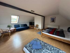 Postel nebo postele na pokoji v ubytování Einkehr zur Rennstrecke