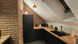 Kuchyň nebo kuchyňský kout v ubytování Modern Penthouse APT2 near Frankfurt + 8 fotografií