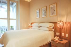 Postel nebo postele na pokoji v ubytování Hotel Casa La Mantilla by Faranda Boutique + 24 fotografií