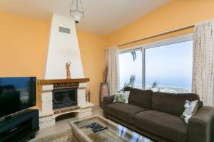 TV a/nebo společenská místnost v ubytování Beautiful villa with stunning view