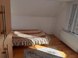 Кровать или кровати в номере Vikend kuća Vukašinović