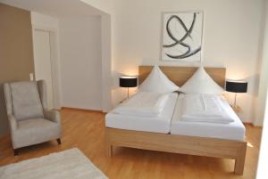 เตียงในห้องที่ Esprit-Apart-Hotel