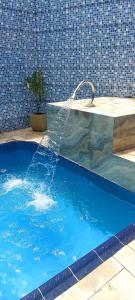 A piscina em ou perto de Casa Mongagua