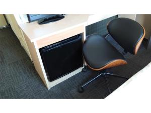 a desk with two chairs in an office at Hotel Area One Oita - Vacation STAY 99711v in Oita +90 photos