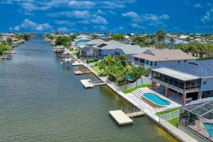 an aerial view of a marina with houses at Waterfront home with pool and gameroom! in Hernando Beach