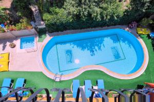 The swimming pool at or close to Mandalinn Hotel